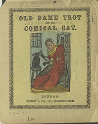 Dame Trot sits with her cat, which is on a stool