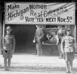 Soldiers Carrying Suffrage Banners in Grand Rapids, C.C. Catt Albums, Bryn Mawr College Library