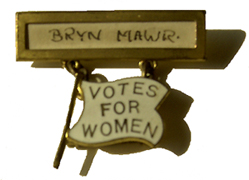 Enter the exhibition. Votes for Women brooch. Women's Suffrage Ephemera Collection, Bryn Mawr College Library